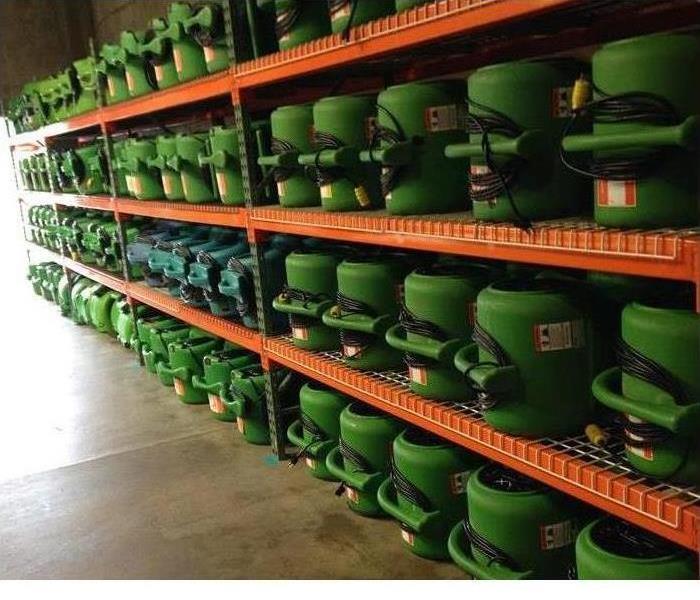 Shelves of our equipment in our warehouse