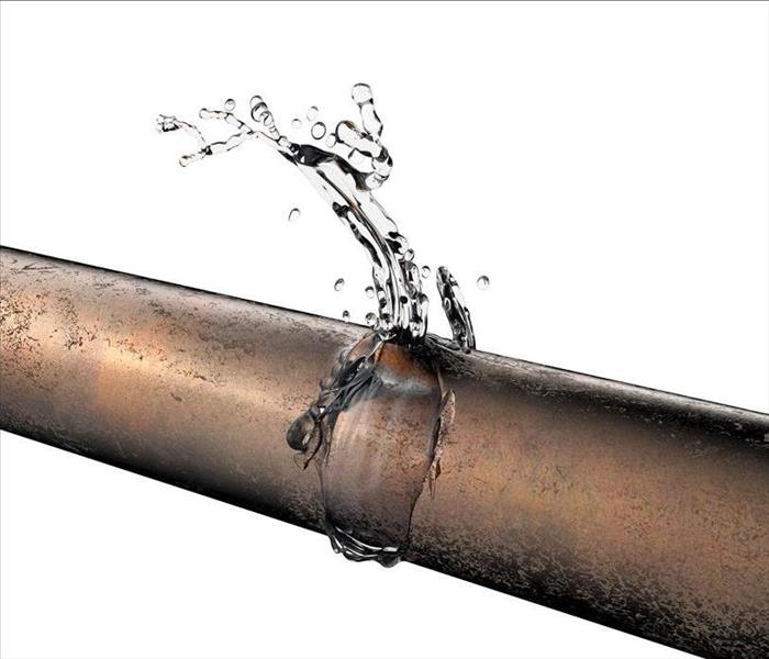 burst copper pipe with water leaking